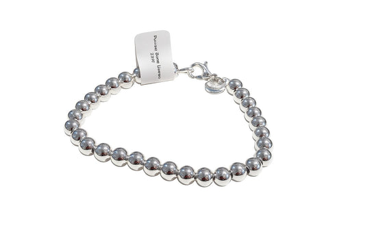 Pulsera bolas de plata
