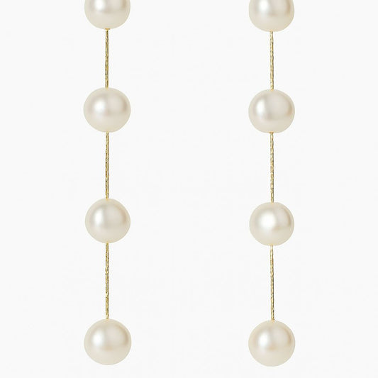 Aretes de perlas largos